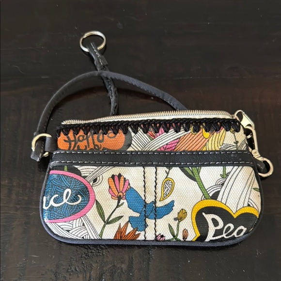 The Sak Vibrant Black and Orange Artistic Clutch Wristlet - Picture 2 of 5